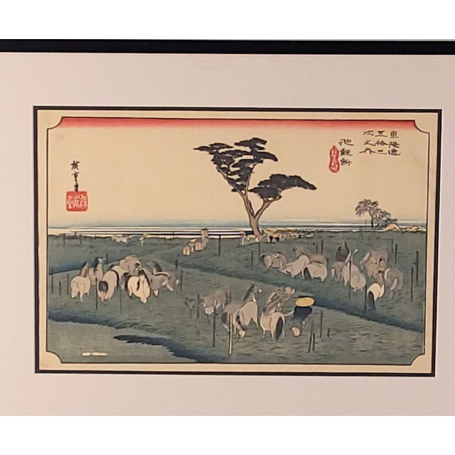 A Hiroshige woodblock print, view of Chiryu with horses, probably vintage.