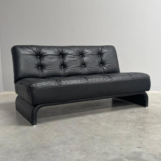 Remarks: Vintage Wittmann sofa by Johannes Spalt, model Constanze, Austria 1960s. In black leather upholstery with padded...
