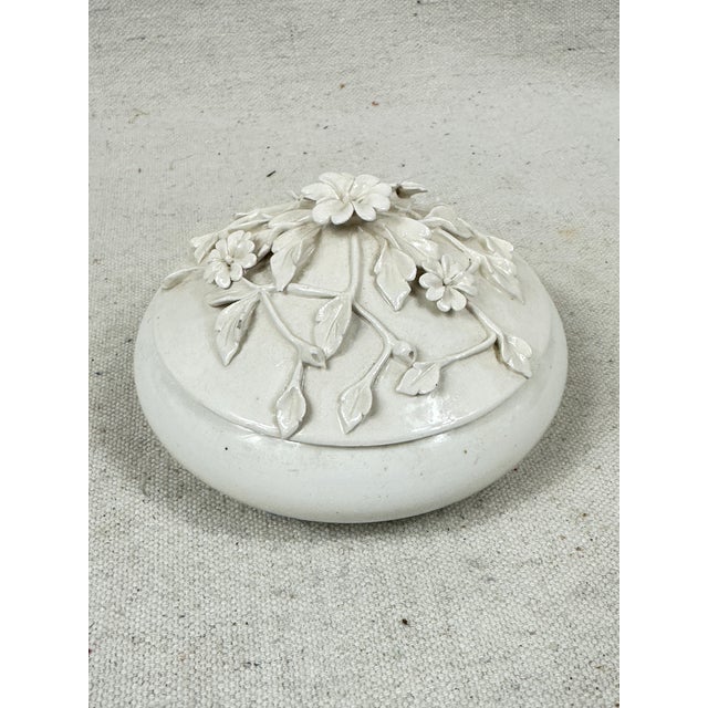 Vintage white ceramic trinket box decorated with flowers and made in Italy. This is a pre-owned item so please see all...
