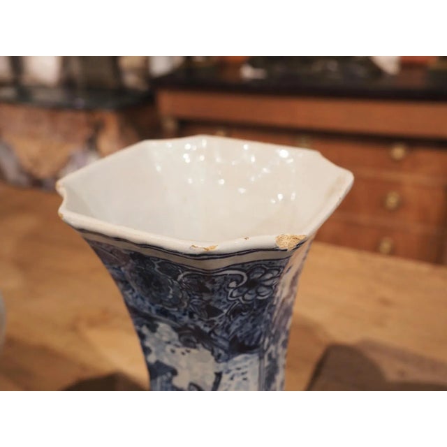 A beautiful set of five blue and white Delft vases, this faience collection was hand-painted in Holland, circa 1900. The...