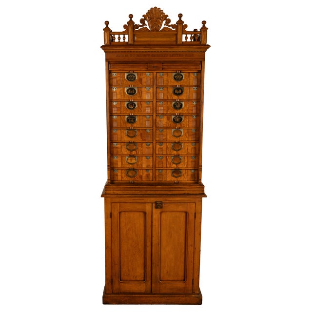 A rare &amp; unusual antique 19th Century American three section tall carved oak roll top file cabinet, by Cameron Amberg...