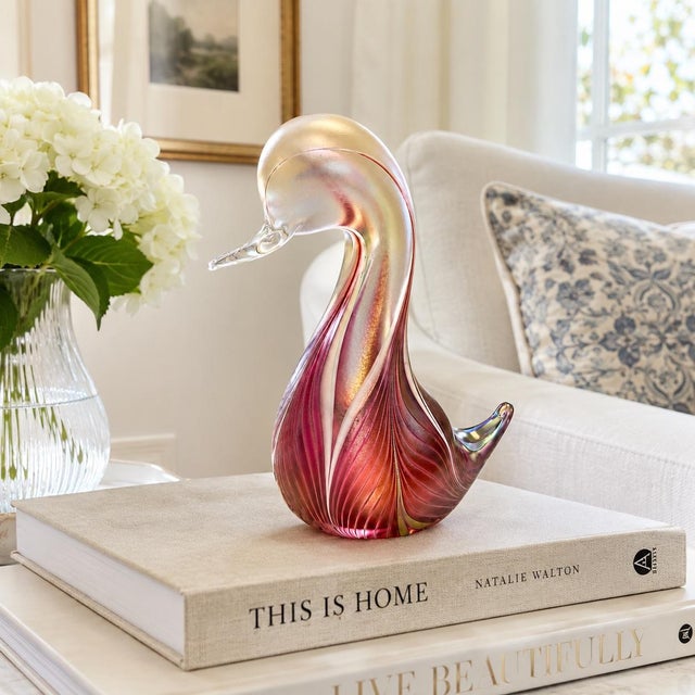 A beautiful vintage art glass swan by American studio glass artist Stuart Abelman, featuring his distinctive pulled-...