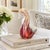 A beautiful vintage art glass swan by American studio glass artist Stuart Abelman, featuring his distinctive pulled-...