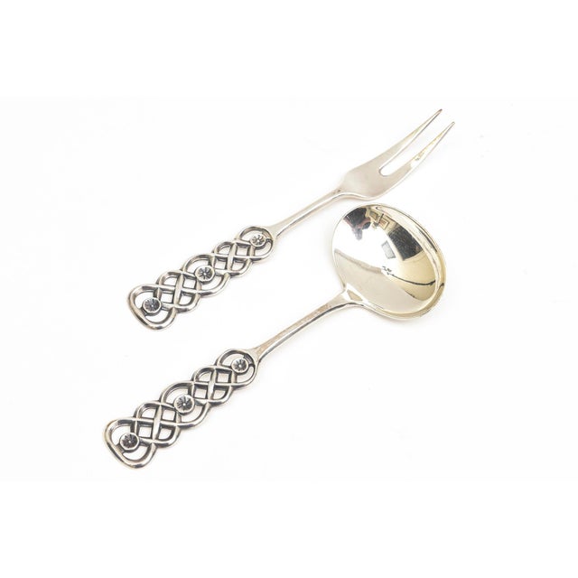 This vintage sterling silver signed David Anderson sculptural set of appetizer fork and spoon set is by the noted artist...