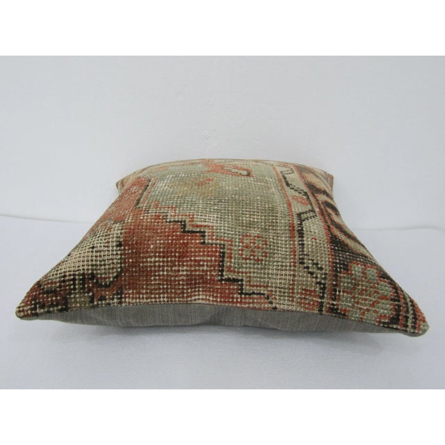 This is a pillow cover made from a vintage kilim rug. The piece was properly washed and ready to use. Pillow inserts not...