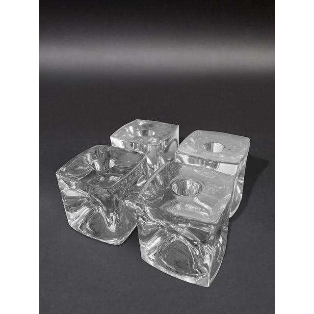An exquisite rare set of 4 Rudolf Jurnikl designed ice cube optic Czech glass candleholders for Sklo Union, from the...