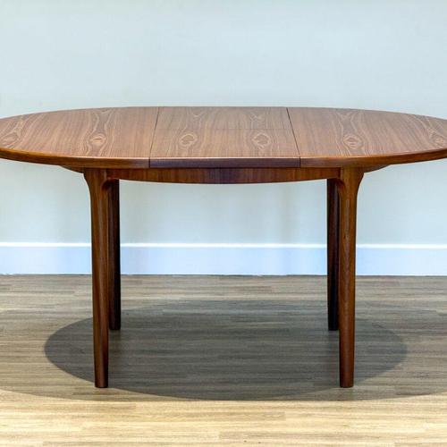 McIntosh Mid-Century Dunvegan Extendable Dining Table with 4 Chairs A refined and timeless mid-century dining set from the...