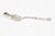 Ornate sterling silver serving spoon featuring an engraved floral handle that is twisted where it meats the bowl.. The...