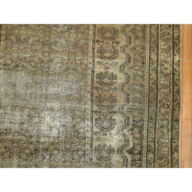 An earth toned shabby chic persian malayer rug 5'2'' x 11'2'' We love the natural wear on this rug because it shows a real...