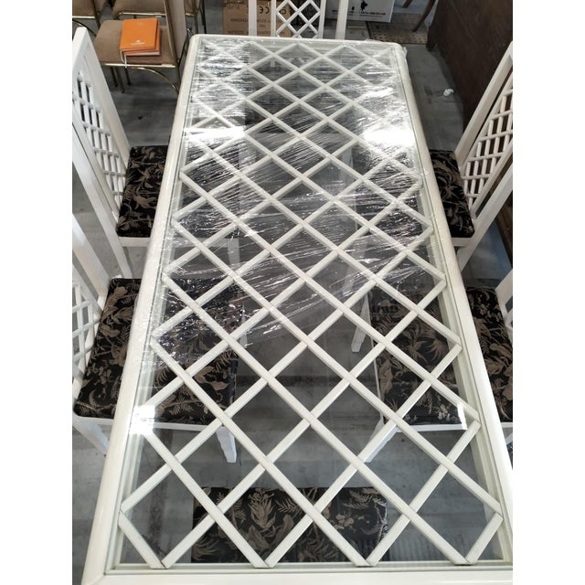 An elegant and refined table with a "vivai del sud" label, the nassau model features a satin white design and a wooden...