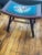 Mahogany bench, with floral design needlepoint saddle style seat and brass tacks.