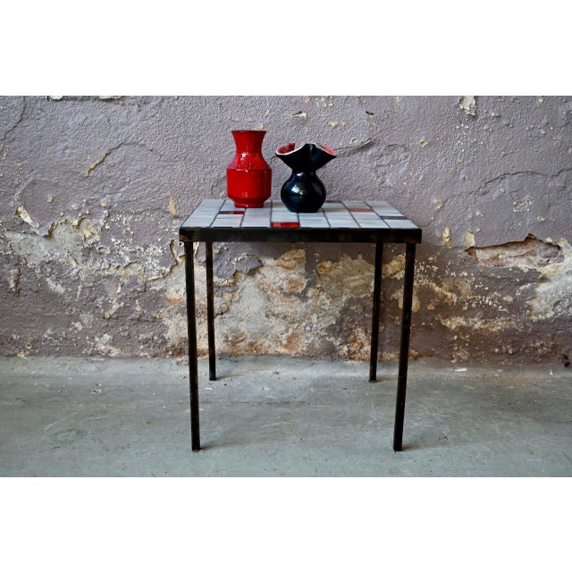 Table with Small Ceramic Tiles attributed to Mado Jolain, in Good conditions. Designed 1960 to 1969 This piece is...