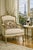 Charming hand made needlepoint pillow cover#2 featuring a beloved pug lounging on a cushion, with a pink bow and...