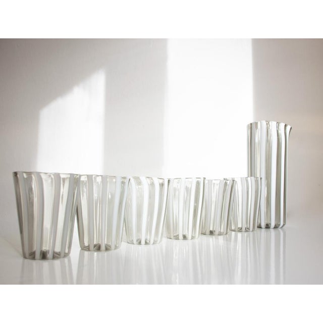 Astonishing drinking set in colored Murano canes made by Angelo Ballarin for Ribes Studio. Gio Ponti glasses are made of...