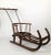 A Victorian wooden sled, the type one often finds on vintage European Christmas cards. Designed for a child, it can be...