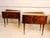 Pair of Art Deco bedside tables, with Mid-Century accents such as the tips of the thin brass legs or the silver gray...