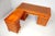 This sophisticated l-shaped executive desk, crafted in the georgian revival style, offers elegance and functionality for a...