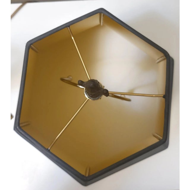 This single ormolu table lamp has the best small details to make up one beautiful piece. The Egyptian woman is perched on...