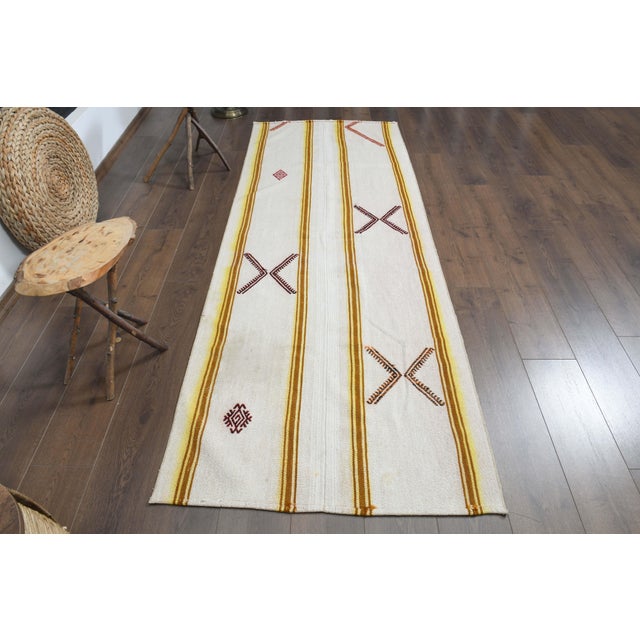 Vintage Turkish Hand-Knotted vintage rug is a semi-antique vintage area rug. The '70s Eastern region of Turkey's unique...