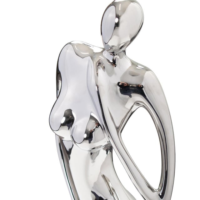Strike a pose! This figure is fashioned from ceramic into an elegant posing female shape. It is then finished in an...
