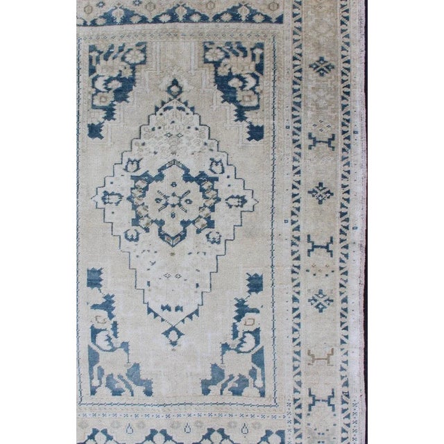 Turkish Vintage Hand Knotted Turkish Oushak Rug With Central Medallion in Blue and Cream For Sale - Image 3 of 12