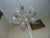 This chandelier features glass crystals. It has six sockets and requires E14 bulbs. European Plug (up to 250V).The wiring...