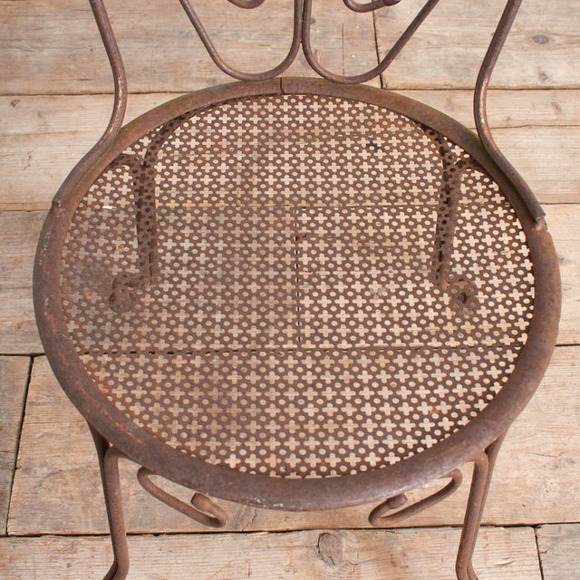 A fantastic original garden chair salvaged from France in a classic early twentieth century design. It has a lovely...