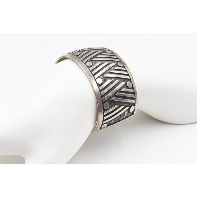 This is part of Chairish’s Costume Jewelry assortment. Mexican sterling silver cuff bracelet. Interior circumference...