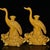 A striking pair of large Chinese yellow glazed porcelain candlesticks. Each piece features a tall, elegantly sculpted...