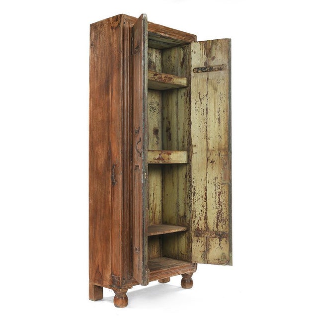 Wooden glass cabinet. Antique teak is an extremely dense wood with exceptional weather resistance. Brown vintage cabinet...