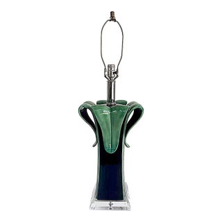 Late 20th Century Lucite and Table Lamp With Ceramic Leaves Opening From a Black Stem For Sale