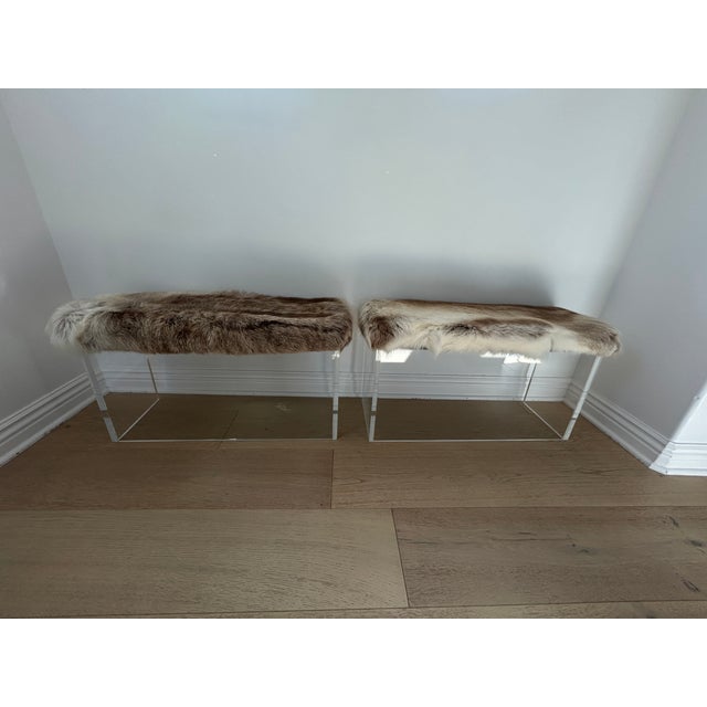 Authentic Reindeer Hide Acrylic Benches designed by acclaimed Mermelada Estudio exclusively for CB2. This rare, matching...
