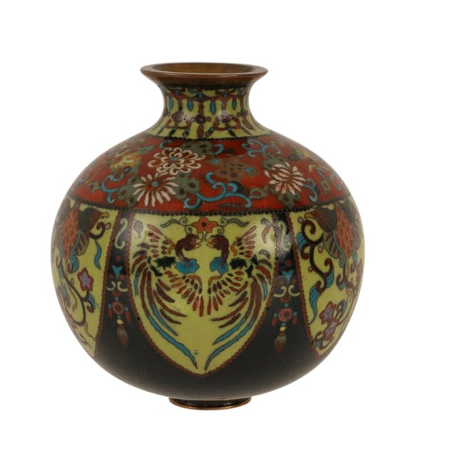 An exquisite and unusually decorated Japanese cloisonne enamel vase from the Meiji period (1868–1912), distinguished by...