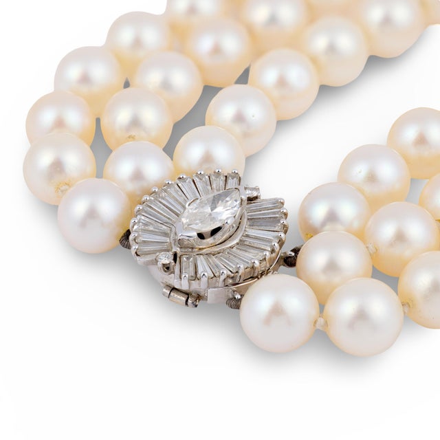 This extraordinary vintage necklace is a luxurious and timeless statement, combining the classic elegance of pearls with...