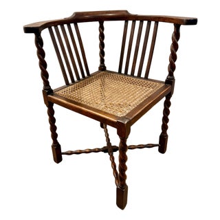 Antique English Oak Corner Chair Featuring a Woven Cane Seat With Barley Twist Legs, Posts, & Stretchers For Sale