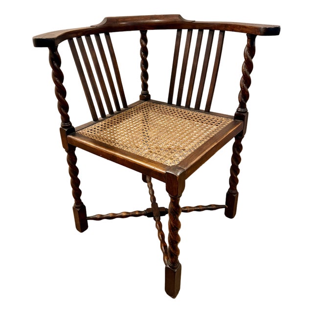 Antique English Oak Corner Chair Featuring a Woven Cane Seat With Barley Twist Legs, Posts, & Stretchers For Sale