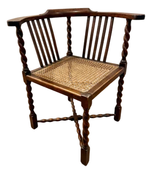 Antique English Oak Corner Chair Featuring a Woven Cane Seat With Barley Twist Legs, Posts, & Stretchers