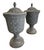 This exceptional pair of vintage garden urns showcases a refined Neoclassical sensibility, masterfully crafted from heavy-...