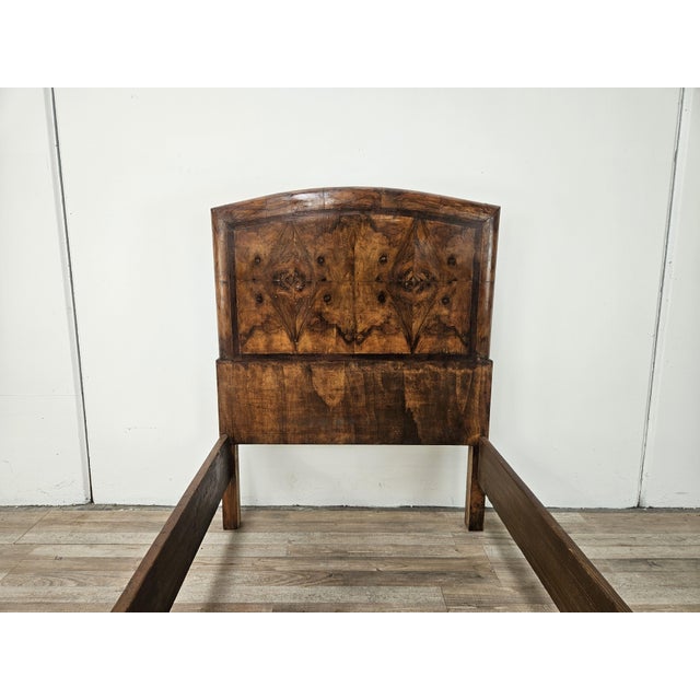 A refined Tuscan Art Deco bed from the 1940s, crafted from fine burl wood with spectacular natural grain, making each...