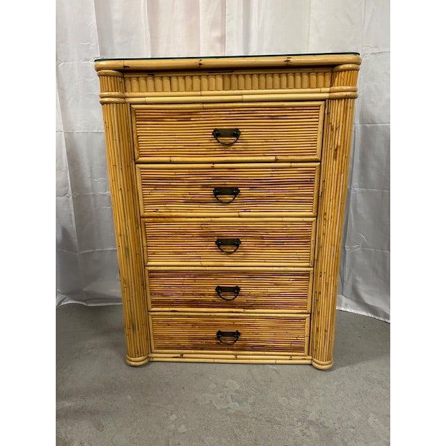 20th Century pencil reed rattan tall chest to add a touch of coastal to your space.
