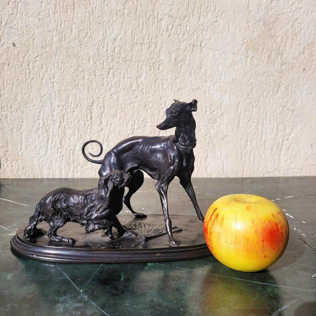 Greyhound and King Charles Spaniel, bronze with a brown patina, signed PJ Mêne A prolific artist, Pierre Jules Mêne...