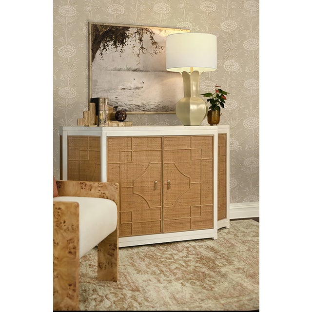 New special order item. Elegant storage meets bohemian style with the Isabel two-door cabinet featuring a decorative Greek...