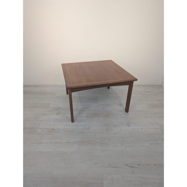 Dania Teak Coffee Table, 1970s This Danish coffee table features a minimalist and timeless design that complements...