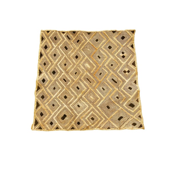 This Vintage Kuba Kasai Velvet Boutallah Raffia Textile from Zaire, Africa features a stunning geometric design and is...