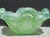 Scalloped bowl with lobed rim of up-down lobes. Speckled pale blue in a bottle green glass. Pontil marks th the bottom....