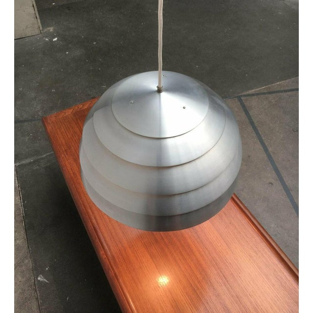 Lamellen Dome pendant lamp from Hans-agne Jakobsson, Markaryd after a design by Hans-Agne Jakobsson The slats steer the...