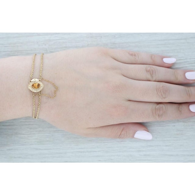 Gemstone Information: - Natural Citrine - Carats - 1.10ct Cut - Oval Brilliant Color - Orange Treatment - Heated Metal:...