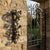 Architecture for Your Walls: The Forged Grapevine Scroll Transform a blank wall into a canvas of iron artistry. This Hand-...