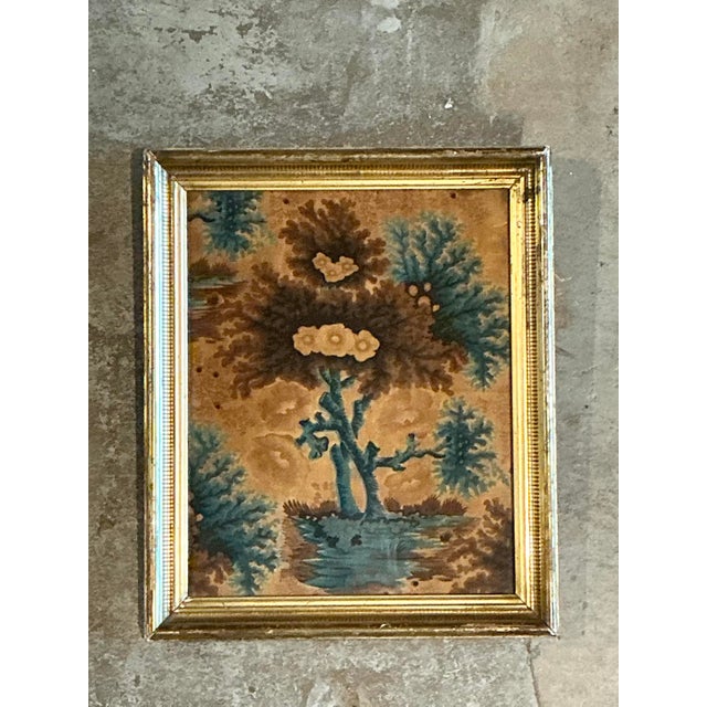 This captivating piece of framed textile art is a sophisticated exploration of color and organic form, reflecting a strong...