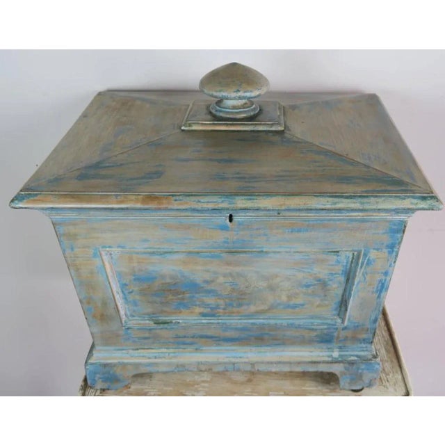 19th century English painted box on original four casters. This box was used as a wine cooler.